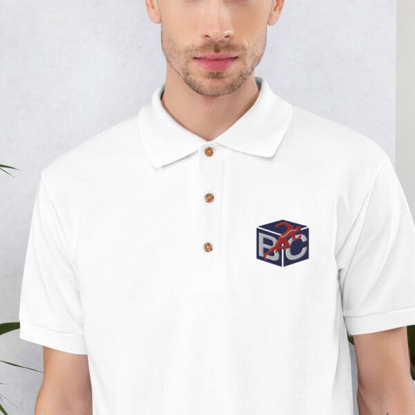 classic-polo-shirt-white-zoomed-in-620534d070ad2.jpg